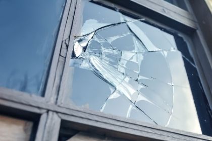 using crime stats to determine the safety of a town; broken window indicating crime in the area